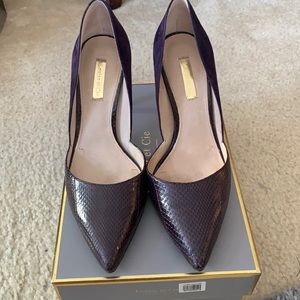 Snake skin and suede.  Beautifully made.